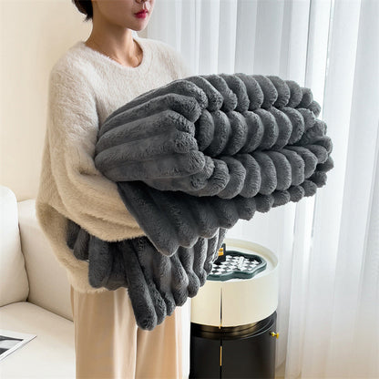 Luxurious faux-rabbit fur throw blanket for ultimate comfort