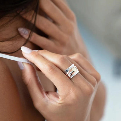 Skanto | Rotating Heart Ring - Amara