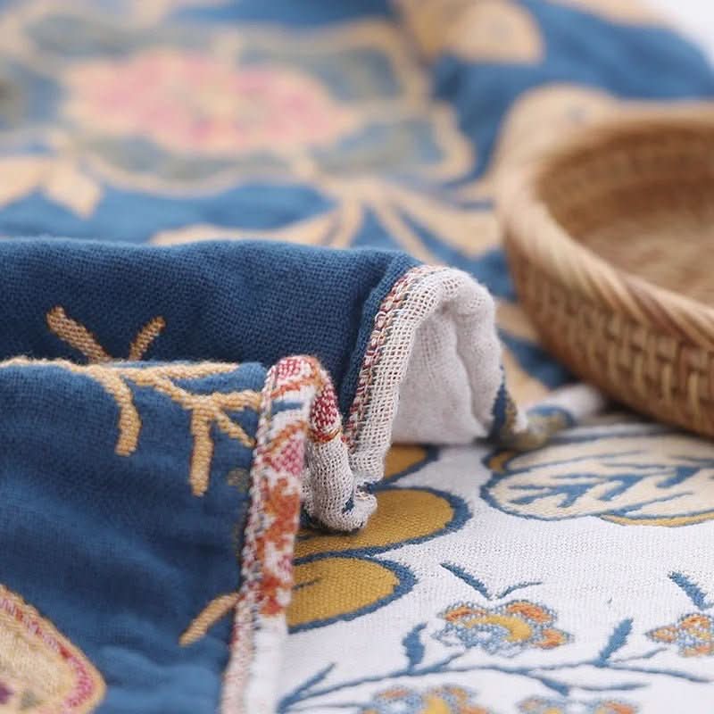 Skanto | Rustic cotton throw with floral design, reversible pattern