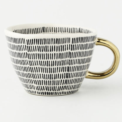BowLift | Cup with abstract geometric pattern and gold handle