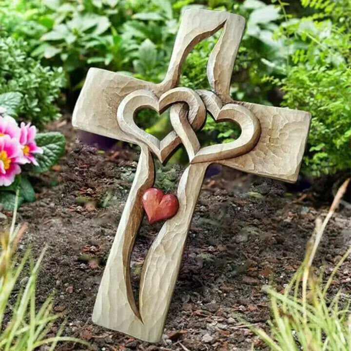 BowLift | Hand-carved wooden cross with intertwined hearts