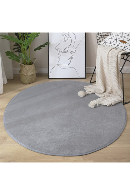 Soft, round rug with coral pattern
