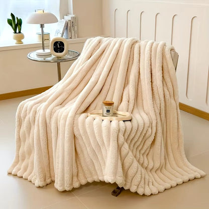 Luxurious faux-rabbit fur throw blanket for ultimate comfort