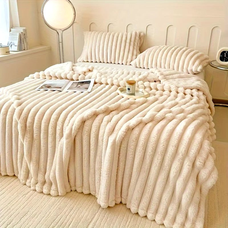 Luxurious faux-rabbit fur throw blanket for ultimate comfort
