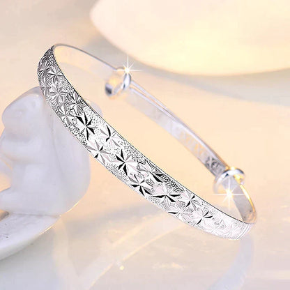 Enchanting Star-Shaped Silver Bracelet for a Radiant Look Bowlift