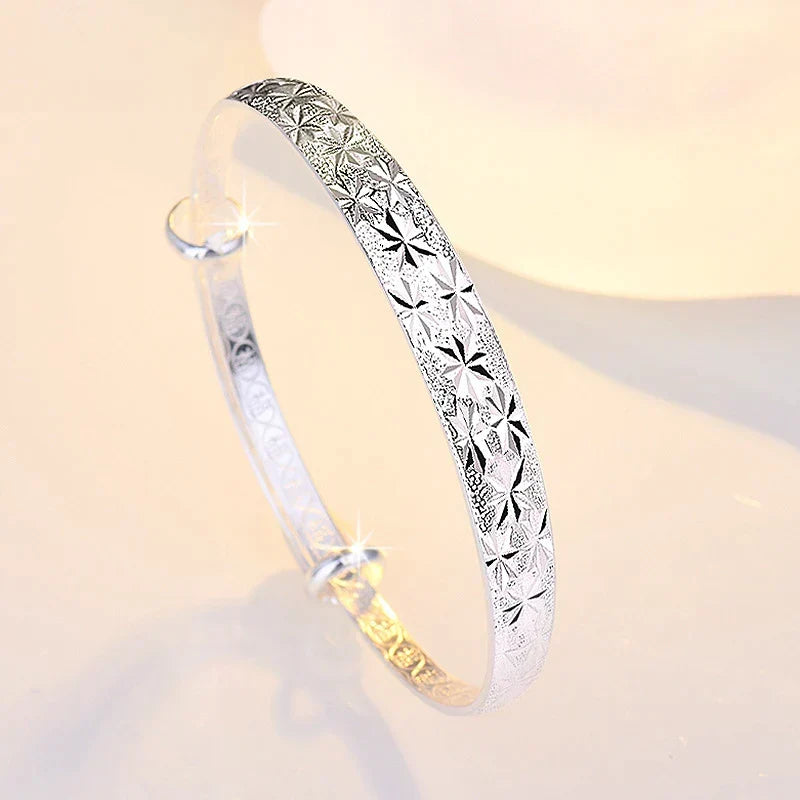 Enchanting Star-Shaped Silver Bracelet for a Radiant Look Bowlift