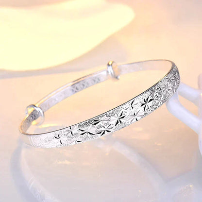 Enchanting Star-Shaped Silver Bracelet for a Radiant Look Bowlift