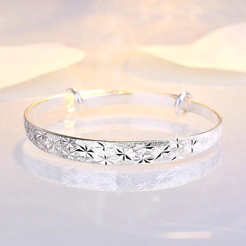 Enchanting Star-Shaped Silver Bracelet for a Radiant Look Bowlift