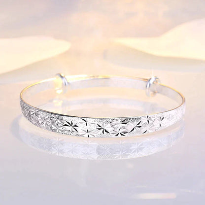 Enchanting Star-Shaped Silver Bracelet for a Radiant Look Bowlift