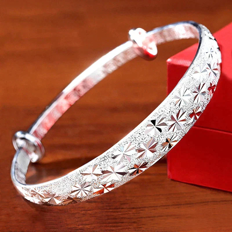 Enchanting Star-Shaped Silver Bracelet for a Radiant Look Bowlift