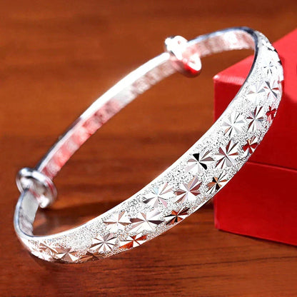 Enchanting Star-Shaped Silver Bracelet for a Radiant Look Bowlift