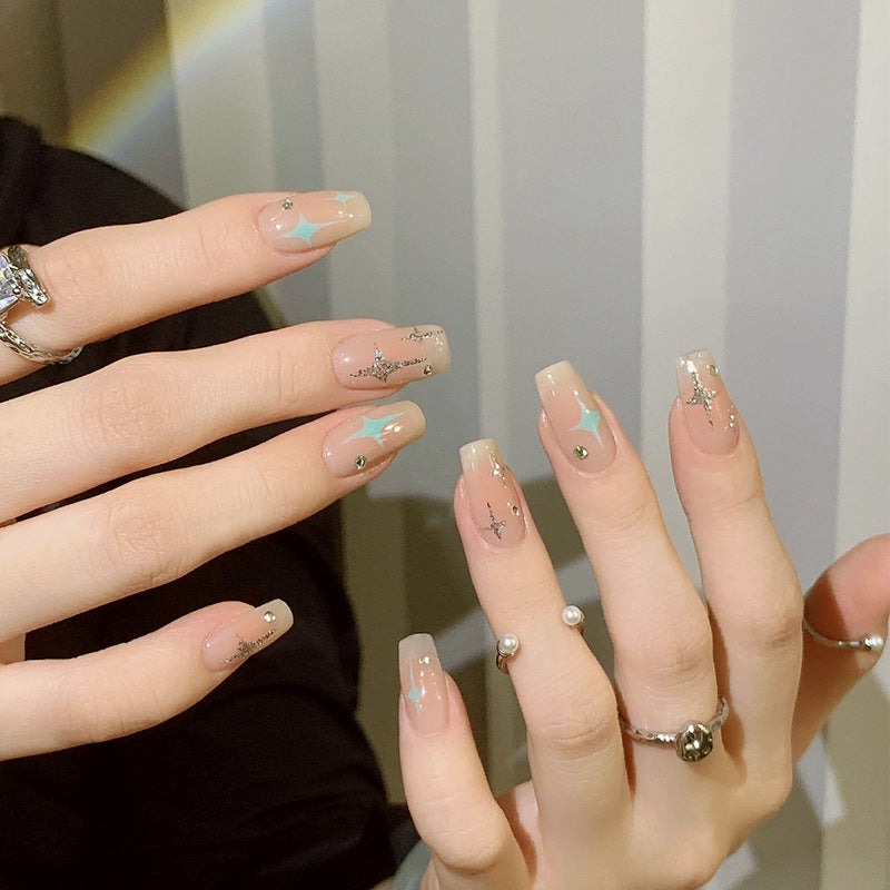 Acrylic nail set with sparkling star and glitter elements Acalora