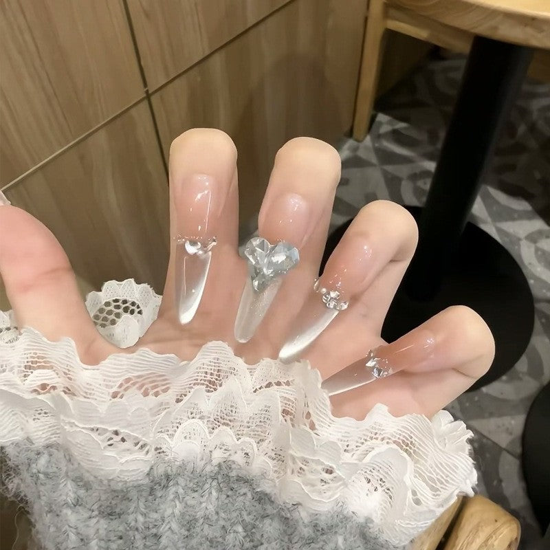 Artificial nail set with elegant tips and crystal accents Acalora
