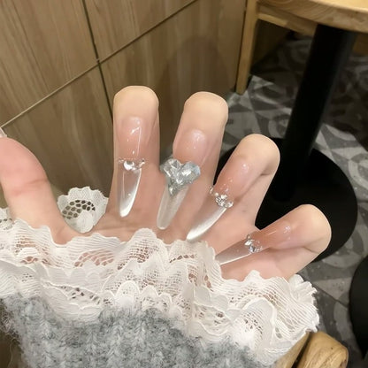 Artificial nail set with elegant tips and crystal accents Acalora