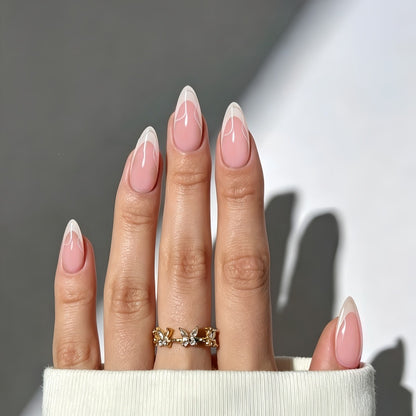 Artificial nails with elegant French design and curved accents Acalora