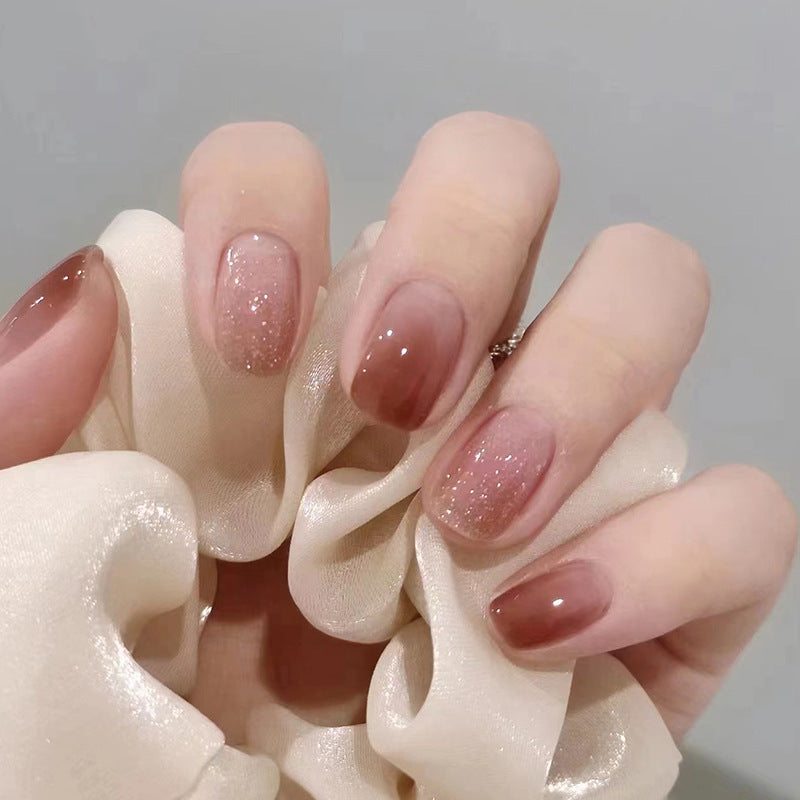 Art nails with delicate gradient colors and glitter effects Acalora