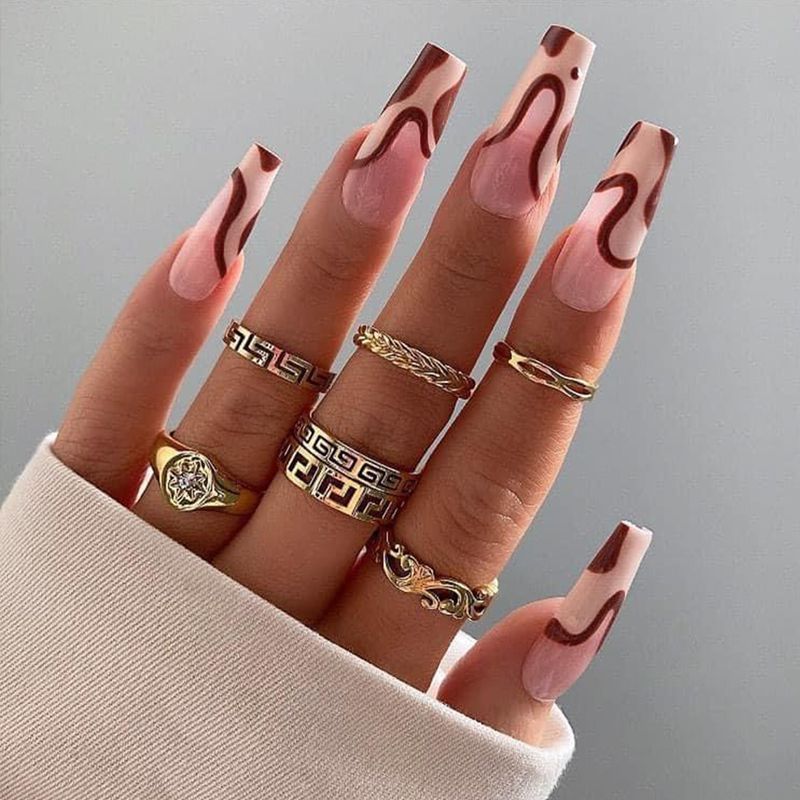 Artificial nail set with unique patterns Acalora