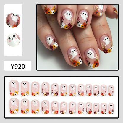 Artificial nails with ghost motif and flower accents Acalora