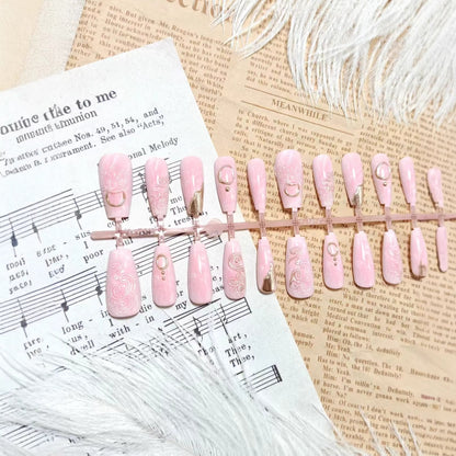 Artificial nails with elegant gold embellishments Acalora