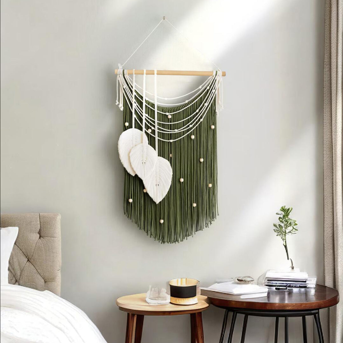 Artistic wall hanging made of macrame with hearts