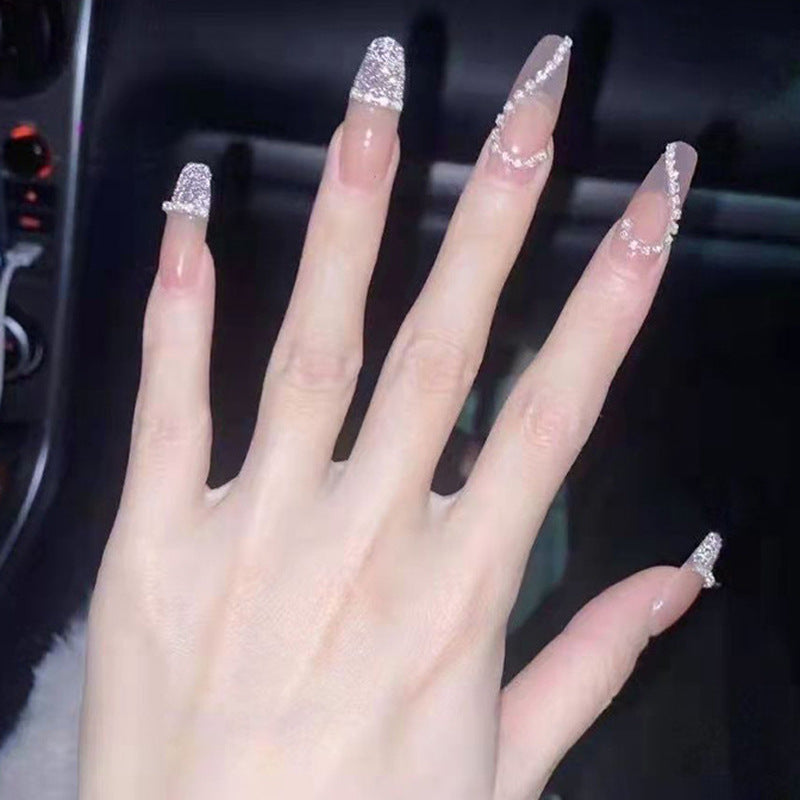 Glamorous artificial nails with heart and glitter design Acalora