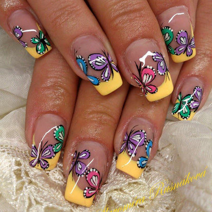 Nail set with intricate butterfly design Acalora