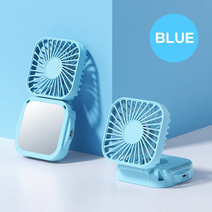 Unisex nan compact foldable clip on handheld desk fan with built in mirror adjustable tilt and USB rechargeable battery Bowlift