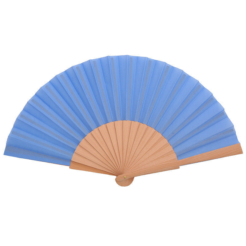 Ladies' elegant hand fan made of lightweight fabric with an elaborate folding pattern Brehn