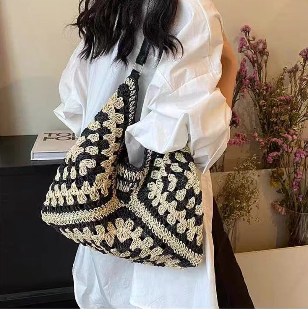 Handbag with artistic macrame design and flexible carrying comfort Skanto