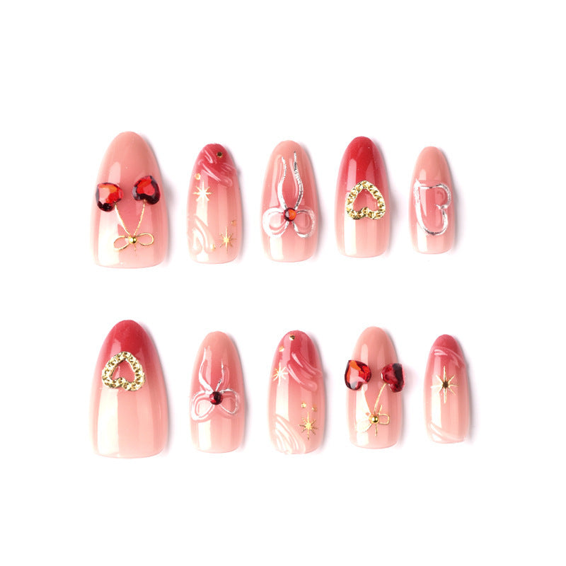 Decorative artificial nails with romantic heart and bow motifs Acalora
