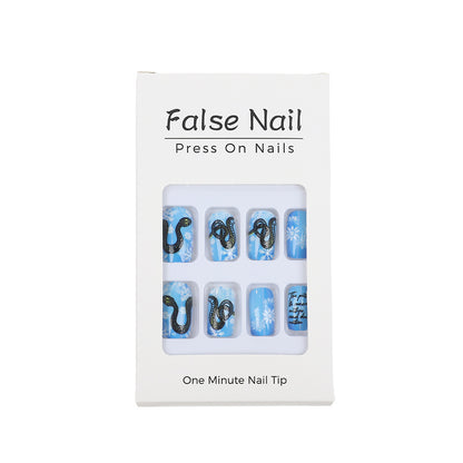 Creative art nails with snowflake and snake motif Acalora