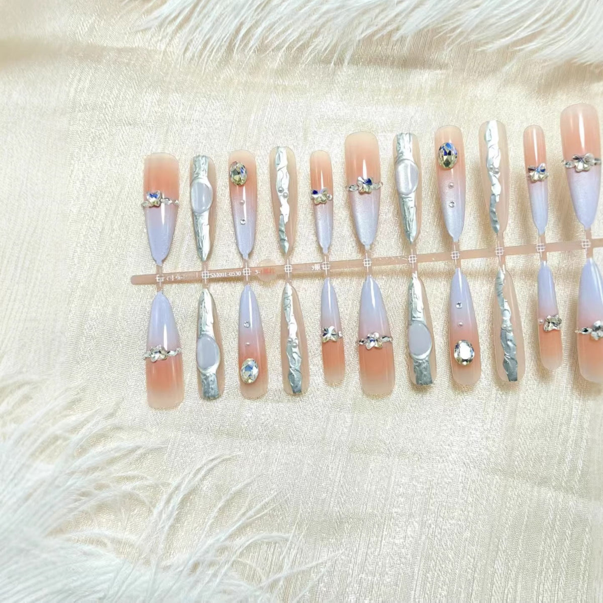 Artificial nails with elegant glitter and crystal accents Acalora