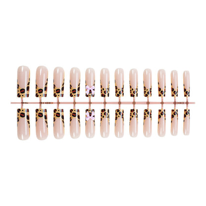 Decorative Stiletto Press-On Nail Art with Animal Print and Bow Accents Acalora