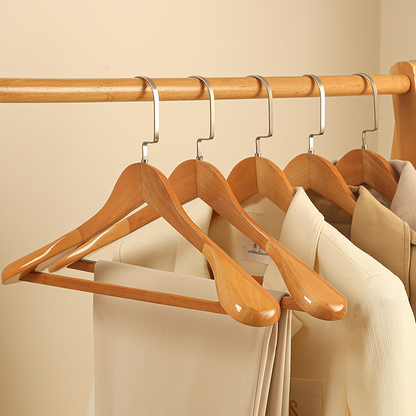 Luxurious wooden clothes hangers with a curved design