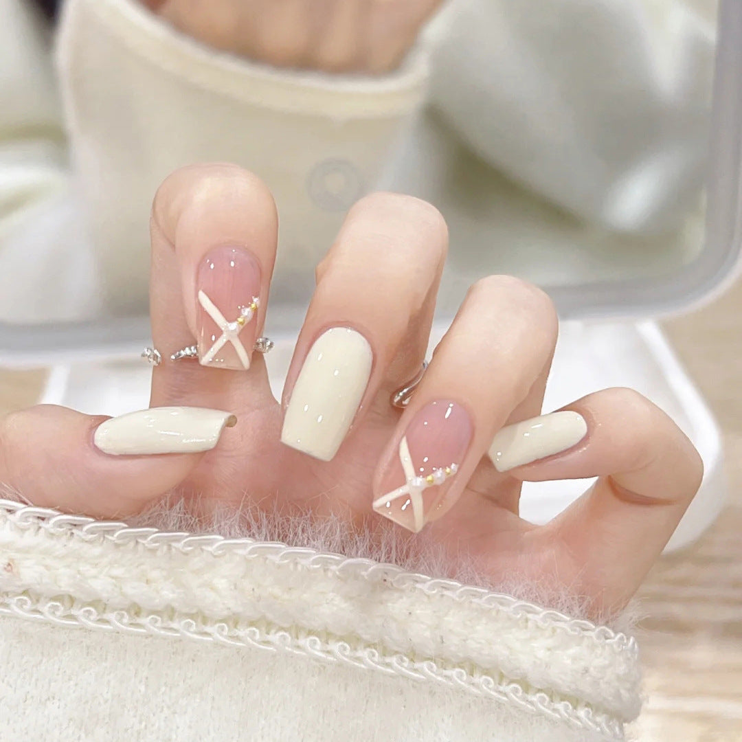Acrylic nail set with elegant and playful design Acalora