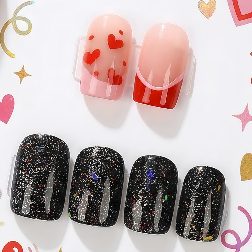 Creative artificial nails with heart design and glitter effects Acalora