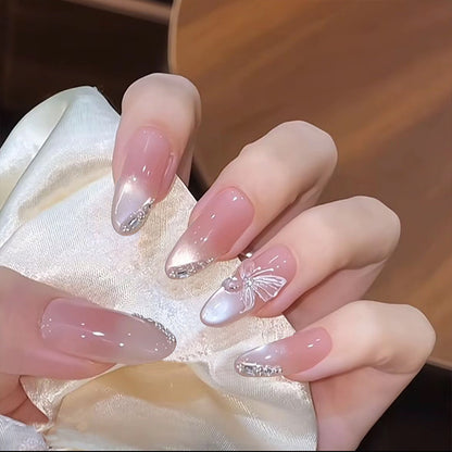 Acrylic nail set with elegant ombre design and sparkling accents Acalora