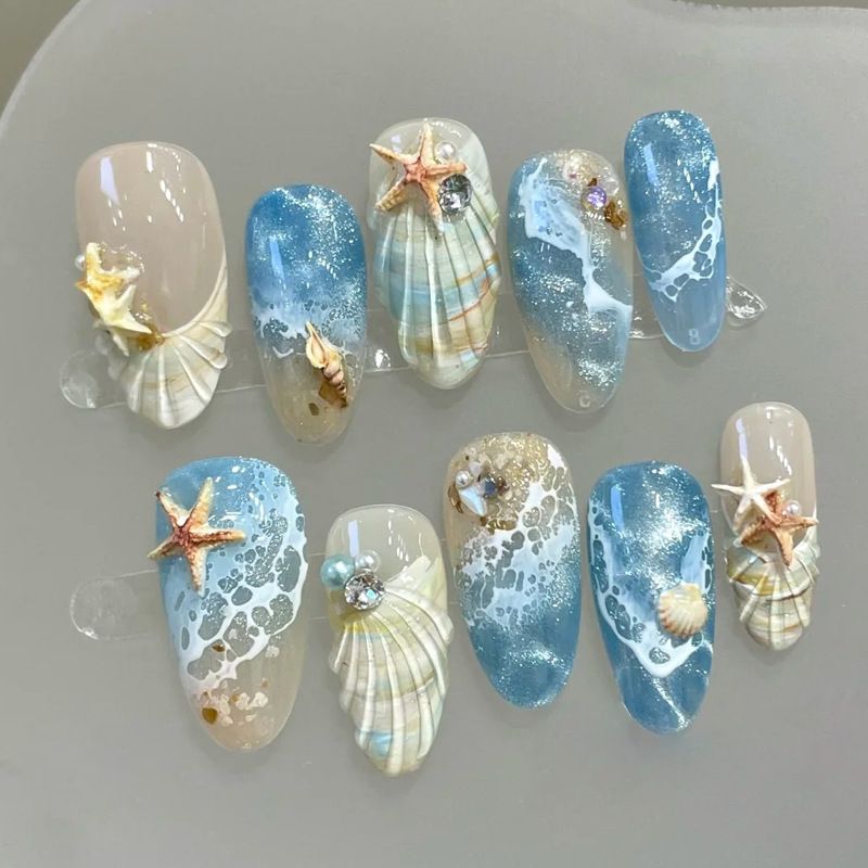 Nail art set with floral patterns and ombre effects Acalora