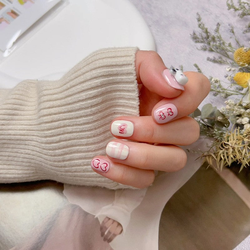 Creative nail art set with modern heart designs Acalora