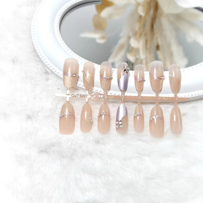 Artificial nails with modern glitter and stone embellishments Acalora