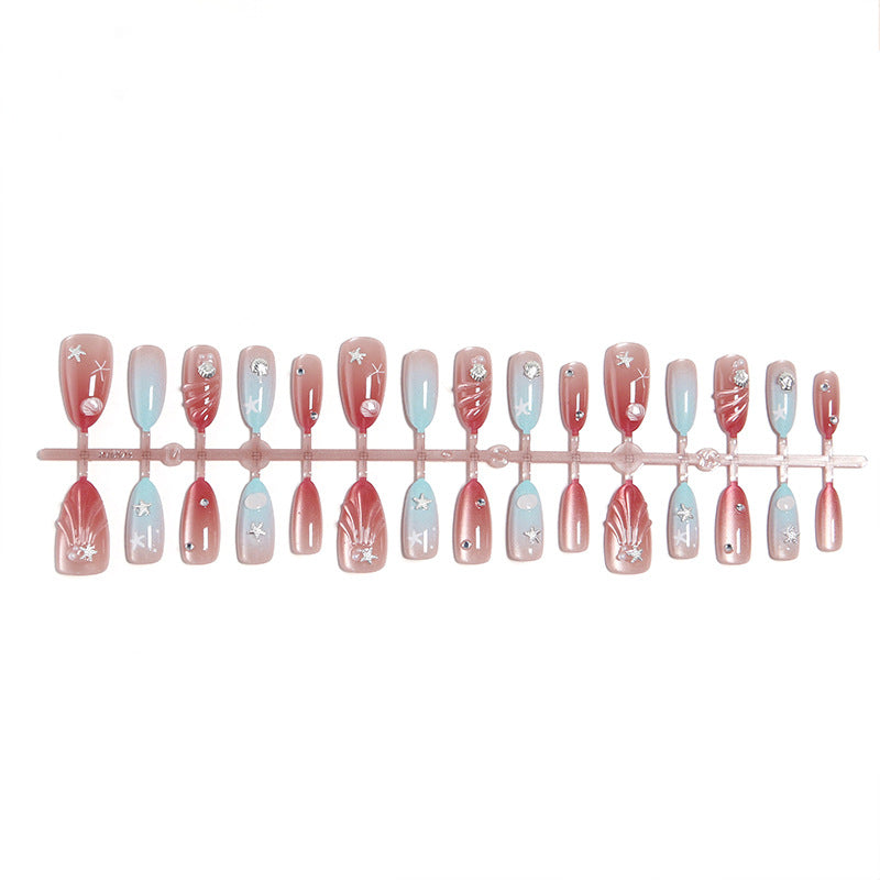 Artificial nails with sparkling rhinestone embellishments and maritime design Acalora