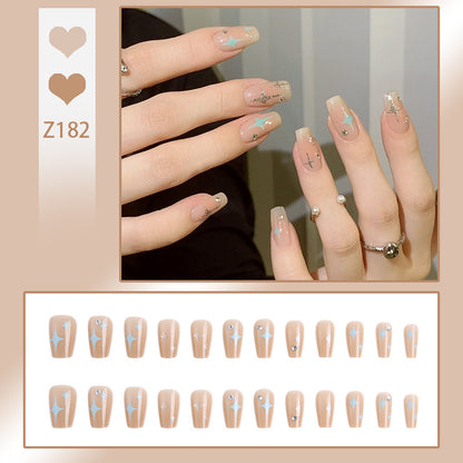 Acrylic nail set with sparkling star and glitter elements Acalora