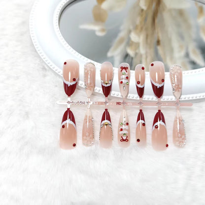 Artificial nails with festive designs and glitter accents Acalora