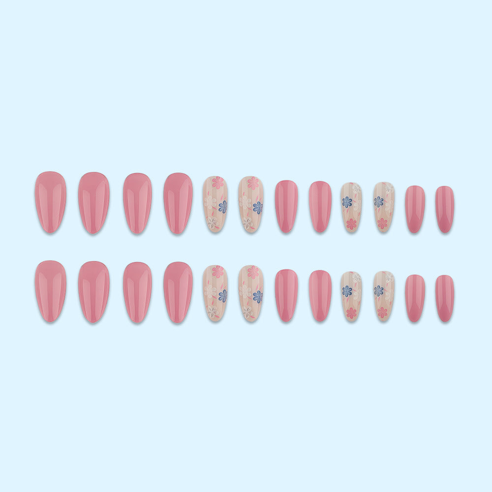 Stylish almond-shaped artificial nails with floral patterns Acalora