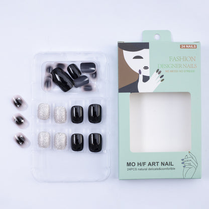 Artificial nails in elegant black with gloss and creative accents Acalora
