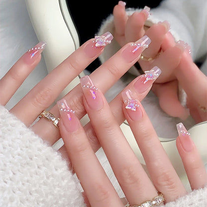 Artificial nails with luxurious pearl and glitter decorations Acalora