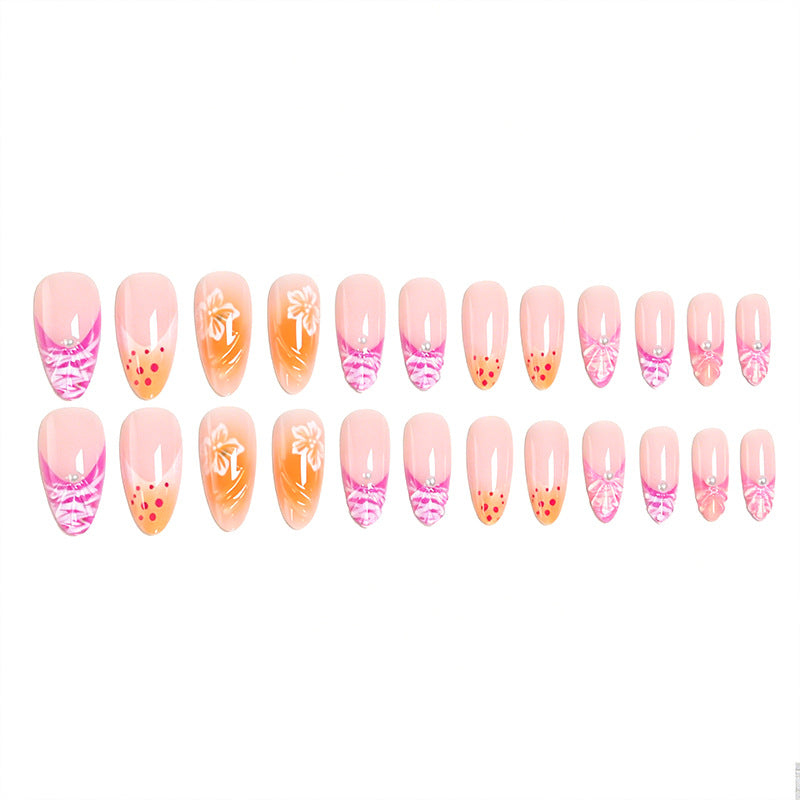 Acrylic nail set with exotic flower patterns and glitter accents Acalora