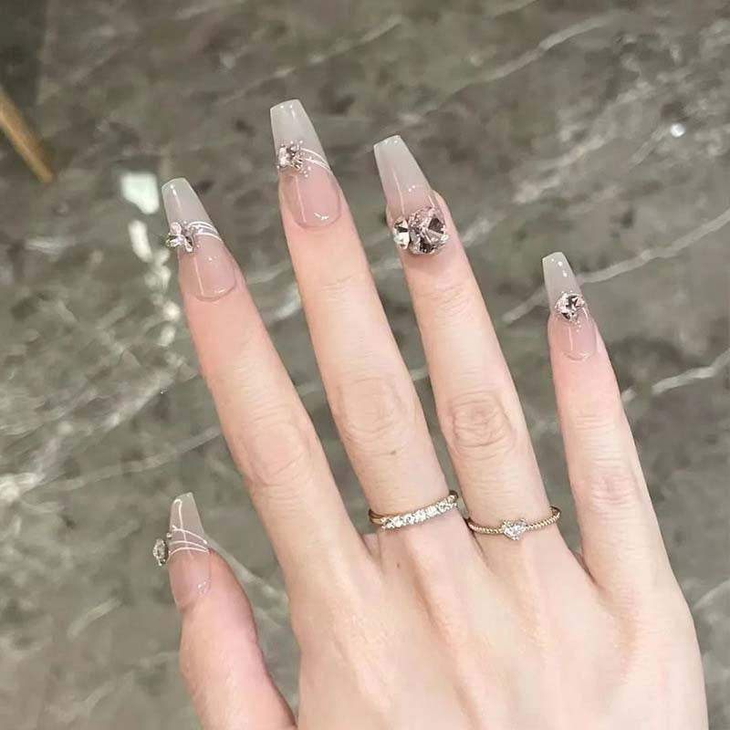 Art nail set with filigree decorations and glamorous accents Acalora