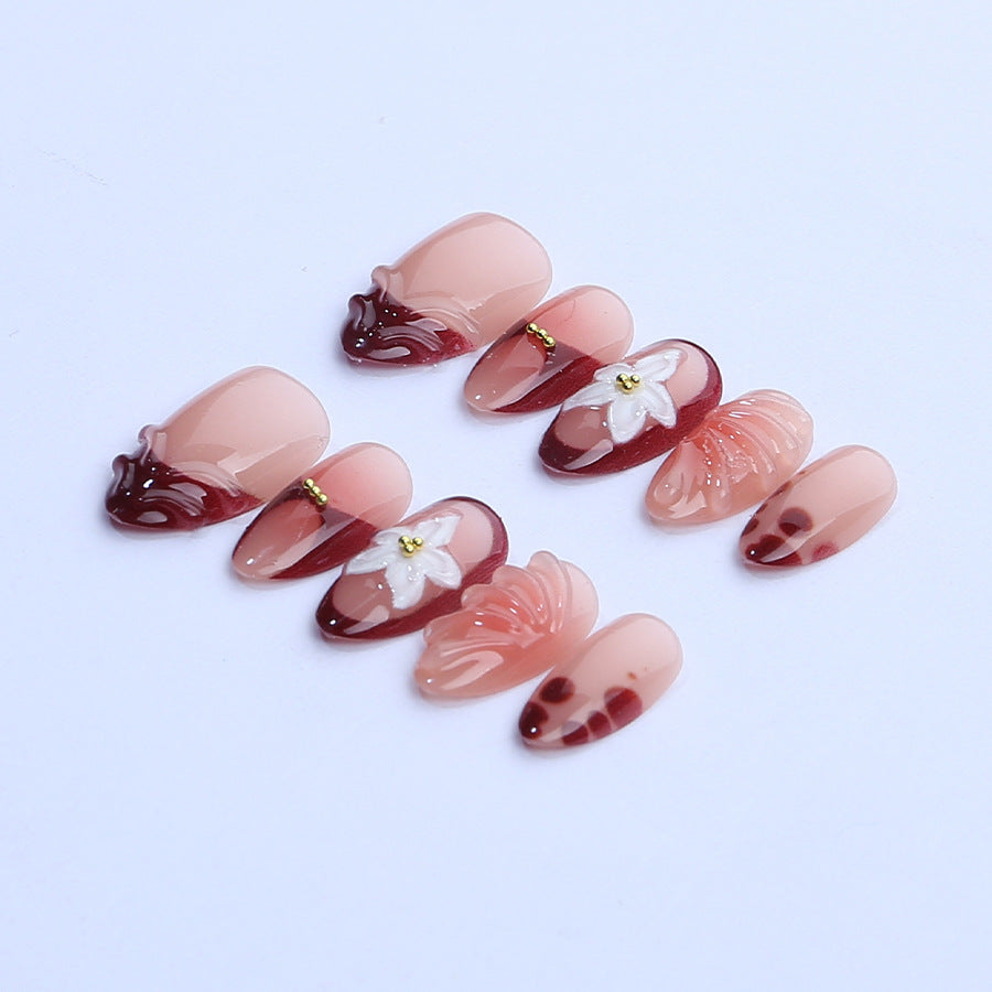 Artificial nail set with floral 3D applications and elegant gradient design Acalora