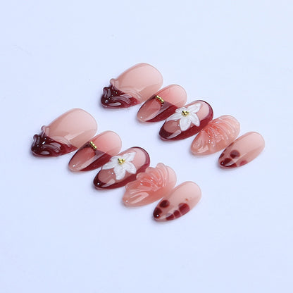 Artificial nail set with floral 3D applications and elegant gradient design Acalora